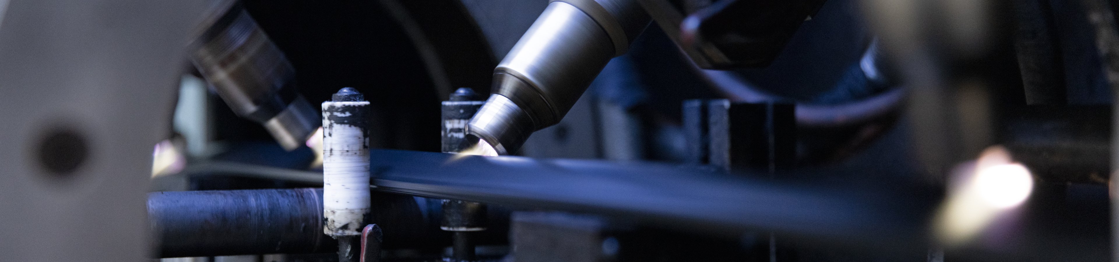 Closeup of a profile running through a machine