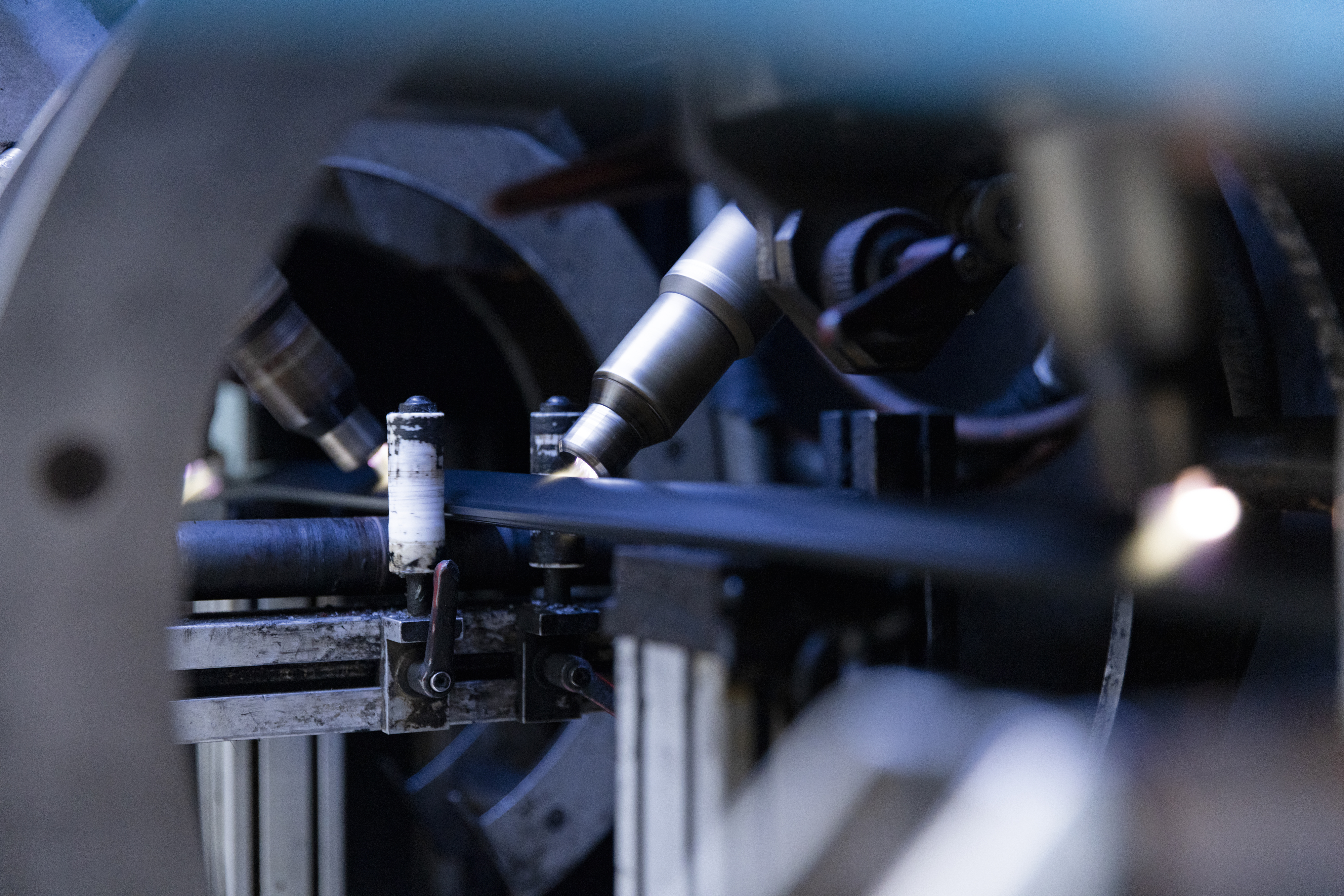 Closeup of a profile running through a machine